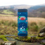 Klean Kanteen flask with hills and mountains in the background