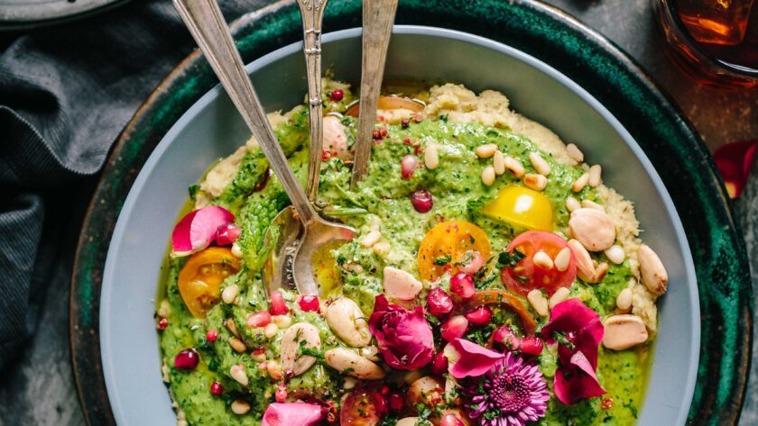 Bowl of colourful vegan food. Vegan eateries in Manchester - Roonee